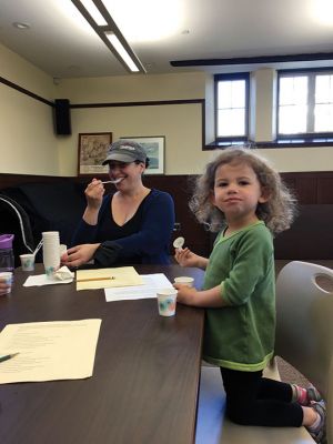 Earth Day 
Earth Day celebrations at the Mattapoisett Library included a final alternative food tasting, this time nondiary ice cream. This was the last in a series of presentations hosted by Library Director Jennifer Jones, part of a larger conversation about sustainability and food choices. Enjoying the taste testing on April 22 was mom Elizabeth Gouveia and her three-year-old daughter Gabrielle. Photo by Marilou Newell
