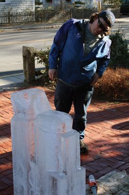 Ice Sculpture at the Marion Art Center
In front of the Marion Art Center, Tim Wade carved out an ice sculpture of a train on December 13, an unseasonably warm December day. The MAC reported several phone calls concerning the heat and whether the event would be canceled. Wade made his icy creation despite the warmth, as he has done for 10 years. Photos by Jean Perry
