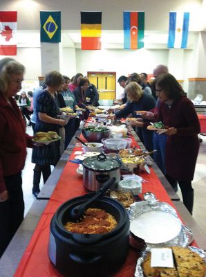 AFS Club International dinner
Old Rochester Regional High School’s AFS Club held an international dinner in the cafeteria on Sunday evening. Students, parents, and community members were invited to bring a dish from another culture to share, so everyone could enjoy a unique and delicious meal. Upward of 50 people attended, including 12 foreign-exchange students in the SouthCoast area representing such countries as Japan, China, Thailand, Germany, Denmark, and Costa Rica. Photo by Rene Rentis
