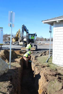 Island Wharf
Construction workers dig a trench that will bury power lines to Marion’s new Maritime Center being built at Island Wharf. Photos by Mick Colageo
