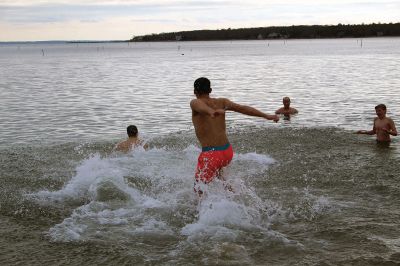 Keep on Plungin’ 
The annual Keep on Plungin’ New Year’s Day swim drew well over 100 participants to Mattapoisett Town Beach, continuing a tradition started in 2013 by Will and Michelle Huggins to help families facing expenses related to cancer care. In the last two years, the community-driven effort has benefitted three families and Dana Farber with a $1,000 donation in Huggins’ honor. This year, organizers anticipate supporting at least two more families with checks for $2,000. Photos by Mick Colageo
