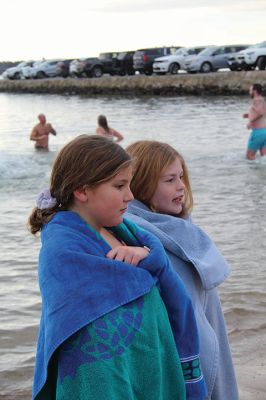 Keep on Plungin’ 
The annual Keep on Plungin’ New Year’s Day swim drew well over 100 participants to Mattapoisett Town Beach, continuing a tradition started in 2013 by Will and Michelle Huggins to help families facing expenses related to cancer care. In the last two years, the community-driven effort has benefitted three families and Dana Farber with a $1,000 donation in Huggins’ honor. This year, organizers anticipate supporting at least two more families with checks for $2,000. Photos by Mick Colageo
