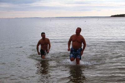 Keep on Plungin’ 
The annual Keep on Plungin’ New Year’s Day swim drew well over 100 participants to Mattapoisett Town Beach, continuing a tradition started in 2013 by Will and Michelle Huggins to help families facing expenses related to cancer care. In the last two years, the community-driven effort has benefitted three families and Dana Farber with a $1,000 donation in Huggins’ honor. This year, organizers anticipate supporting at least two more families with checks for $2,000. Photos by Mick Colageo
