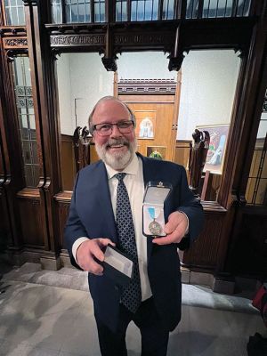 John Vaughn
John Vaughn of St. Anthony’s, Mattapoisett, receiving the Marian Medal. Photo by Lisa Hill
