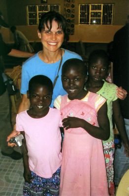 Kenya Relief
Mattapoisett resident Marina Wurl poses with children from a Kenyan orphanage. Ms. Wurl and her husband Greg, both pharmacists, recently visited a small village in Kenya to help with a medical clinic. They took occasional breaks from their work to play with the Kenyan children. Photo courtesy the Wurl family.
