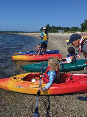 Kayak Clinic
August 9 and 10, the Mattapoisett Land Trust in partnership with the Mattapoisett Recreation Department held two kayak clinics for children ages 8 to 12. MLT volunteers provided safety instructions, a major focus of the program. Kayak introductory instruction has been provided by the two organizations for six years. This year local photographer and author Donna Lee Tufts greeted the children at the end of the program, sharing her thoughts of the joy of kayaking and presenting each child with a copy of her b
