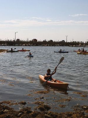 Kayak Clinic
August 9 and 10, the Mattapoisett Land Trust in partnership with the Mattapoisett Recreation Department held two kayak clinics for children ages 8 to 12. MLT volunteers provided safety instructions, a major focus of the program. Kayak introductory instruction has been provided by the two organizations for six years. This year local photographer and author Donna Lee Tufts greeted the children at the end of the program, sharing her thoughts of the joy of kayaking and presenting each child with a copy of her b
