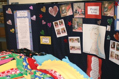 Project Linus
Jane Tougas' Enrichment Class of eighth graders at Old Rochester Regional Junior High School worked hard in October and November to make over 50 blankets for Project Linus, a charity that provides handmade security blankets to seriously ill and traumatized children. The students involved say that they learned "We Can Make a Difference" and "Everyone Needs Something to Love". Photo by Anne O'Brien-Kakley.
