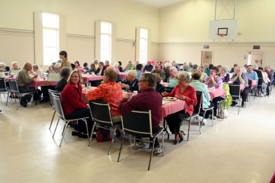 Lion's Dinner
The Mattapoisett Lions Club, with help from Mattapoisett Boy Scout Troup 53, welcomed about one hundred seniors to Mattapoisett Congregation Church's Reynard Hall for a special afternoon dinner on Saturday April, 18. The Lions Club served a hot turkey supper with all of the trimmings and also provided musical entertainment for the diners listening pleasure. Photo by Robert Chiarito
