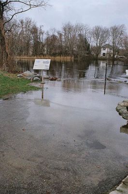 River Road Flood
Wanderer reader Judith Lamson shared these photos of the River Road area when the Mattapoisett River overflowed on Wednesday, March 31. The road was closed to traffic and the plaque base in front of the Herring Run was submerged in water. Photo by Judith Lamson.
