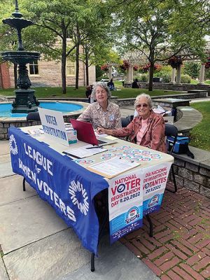 League of Women Voters
The League of Women Voters of South Coast registered voters at Custom House Square in New Bedford on September 20 as part of National Voter Registration Day. Over 4,100 partners participated in providing information on early and online voting, polling locations, as well as signing up voters. Here, Phoebe Girard of South Dartmouth and Cathy Martens of Marion staff the volunteer table. The newly reorganized League of Women Voters of South Coast is a nonpartisan, civic organization which includes communities 
