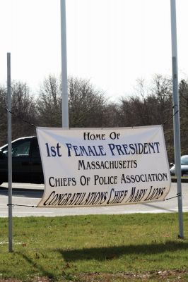 Top Cop
A banner proudly displays Mattapoisett Police Chief Mary Lyons' achievement. Chief Lyons was sworn in as president of the Massachusetts Chiefs of Police Association on December 10, 2009. Chief Lyons is the first female president since the Association was founded in 1887. Photo by Anne O'Brien-Kakley.
