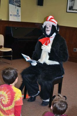 Mattapoisett Free Library Birthday
“Say Triskaidekaphobia!” the Cat in the Hat told the children, posing for a photo at the Mattapoisett Free Library on Saturday, March 22. What the heck is that, the children asked the Cat in the Hat. “Google it!” he told the children laughing at his silliness. The library knows how to throw a party, celebrating five years since the Friends of the Mattapoisett Library funded the expansion of the library. “They even bought a cake,” said Children’s Services Librarian Sandra Burke.  By Jean Perry
