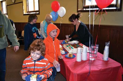 Mattapoisett Free Library Birthday
“Say Triskaidekaphobia!” the Cat in the Hat told the children, posing for a photo at the Mattapoisett Free Library on Saturday, March 22. What the heck is that, the children asked the Cat in the Hat. “Google it!” he told the children laughing at his silliness. The library knows how to throw a party, celebrating five years since the Friends of the Mattapoisett Library funded the expansion of the library. “They even bought a cake,” said Children’s Services Librarian Sandra Burke.  By Jean Perry
