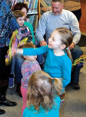 Take Your Child to the Library Day
There were tons of family-friendly activities at the Plumb Library on February 4 for the annual Take Your Child to the Library Day. Junior Friends of the Library were on hand, as well as Miss Lisa leading the kids in physical exercises, and Amos the “read to me” greyhound made a few new friends. Photos by Deina Zartman
