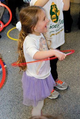 Take Your Child to the Library Day
There were tons of family-friendly activities at the Plumb Library on February 4 for the annual Take Your Child to the Library Day. Junior Friends of the Library were on hand, as well as Miss Lisa leading the kids in physical exercises, and Amos the “read to me” greyhound made a few new friends. Photos by Deina Zartman
