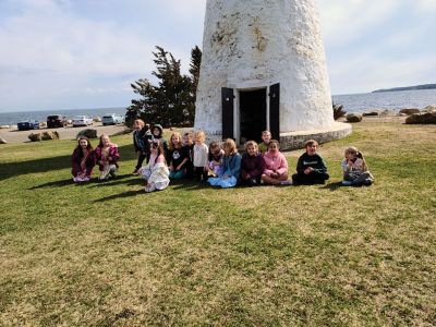 Ned’s Point Birthday
This past Saturday, Ev had her eighth birthday party at Ned’s Point lighthouse. The day was filled with kite flying and drinking tea with the added bonus of lighthouse tours. Joe Dawiki with the Coast Guard Auxiliary helped us arrange a tour. The kids had a blast and so did the parents. Ned’s Point Light needs restoration. I recommend your next party to be held there to shine light on the need and spread awareness. Donations are appreciated to preserve the history of Mattapoisett. Photo by Rebecca Harris
