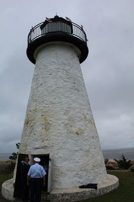 Ned’s Point Lighthouse
Tuesday afternoon offered a sneak preview of the reopening of Ned’s Point Lighthouse scheduled for Saturday, October 9, from 11:00 am to 2:00 pm. Cathy Hardy and Mike Lally, a Texas couple, happened to be in the right place at the right time to become the first visitors to the 183-year-old lighthouse that had been closed for the past two years and three months. The lighthouse typically draws 100 visitors from all over the world when open during any regular, three-hour session. Photo by Mick Colageo
