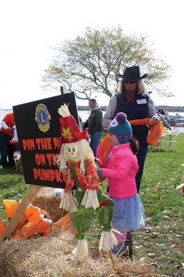 Family Fun Festival 
The Mattapoisett Lions Club held its first Family Fun Festival at Shipyard Park on Saturday, October 29, featuring some good old-fashioned fun and games. Over 400 people turned out for the event, which included hayrides through the village, a pumpkin patch, and games such as pin the nose on the pumpkin and the corn hole toss. Photos by Jean Perry
