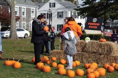 Family Fun Festival 
The Mattapoisett Lions Club held its first Family Fun Festival at Shipyard Park on Saturday, October 29, featuring some good old-fashioned fun and games. Over 400 people turned out for the event, which included hayrides through the village, a pumpkin patch, and games such as pin the nose on the pumpkin and the corn hole toss. Photos by Jean Perry
