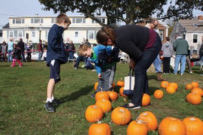 Family Fun Festival 
The Mattapoisett Lions Club held its first Family Fun Festival at Shipyard Park on Saturday, October 29, featuring some good old-fashioned fun and games. Over 400 people turned out for the event, which included hayrides through the village, a pumpkin patch, and games such as pin the nose on the pumpkin and the corn hole toss. Photos by Jean Perry
