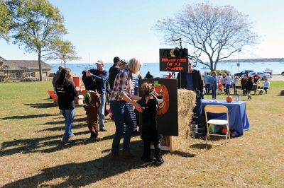 Family Fun Festival 
Families came out in record numbers to enjoy the 4th Annual Fall Free Family Fun Festival sponsored by the Mattapoisett’s Lion Club on October 19 held at Shipyard Park. Bruce Rocha of the club estimated attendance at over 400. Kids and adults alike enjoyed free face painting, bowling with pumpkins, a corn hole toss, snacks, hayrides to Ned’s Point and, yes, free pumpkins to take home. Photos by Marilou Newell and Sandra Frechette
