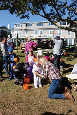 Family Fun Festival 
Families came out in record numbers to enjoy the 4th Annual Fall Free Family Fun Festival sponsored by the Mattapoisett’s Lion Club on October 19 held at Shipyard Park. Bruce Rocha of the club estimated attendance at over 400. Kids and adults alike enjoyed free face painting, bowling with pumpkins, a corn hole toss, snacks, hayrides to Ned’s Point and, yes, free pumpkins to take home. Photos by Marilou Newell and Sandra Frechette
