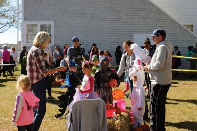 Family Fun Festival 
Families came out in record numbers to enjoy the 4th Annual Fall Free Family Fun Festival sponsored by the Mattapoisett’s Lion Club on October 19 held at Shipyard Park. Bruce Rocha of the club estimated attendance at over 400. Kids and adults alike enjoyed free face painting, bowling with pumpkins, a corn hole toss, snacks, hayrides to Ned’s Point and, yes, free pumpkins to take home. Photos by Marilou Newell and Sandra Frechette
