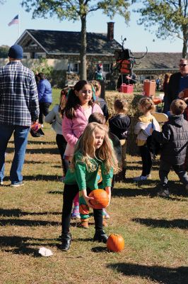 Family Fun Festival 
Families came out in record numbers to enjoy the 4th Annual Fall Free Family Fun Festival sponsored by the Mattapoisett’s Lion Club on October 19 held at Shipyard Park. Bruce Rocha of the club estimated attendance at over 400. Kids and adults alike enjoyed free face painting, bowling with pumpkins, a corn hole toss, snacks, hayrides to Ned’s Point and, yes, free pumpkins to take home. Photos by Marilou Newell and Sandra Frechette
