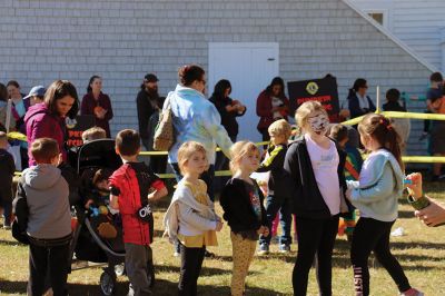 Family Fun Festival 
Families came out in record numbers to enjoy the 4th Annual Fall Free Family Fun Festival sponsored by the Mattapoisett’s Lion Club on October 19 held at Shipyard Park. Bruce Rocha of the club estimated attendance at over 400. Kids and adults alike enjoyed free face painting, bowling with pumpkins, a corn hole toss, snacks, hayrides to Ned’s Point and, yes, free pumpkins to take home. Photos by Marilou Newell and Sandra Frechette
