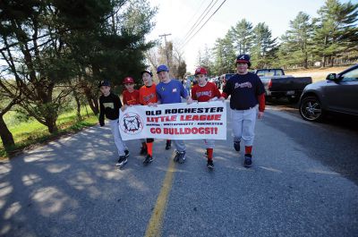 Old Rochester Little League
 The Old Rochester Little League held their parade and opening day on Saturday April 27. The festivities included the National Anthem sung by Jennel Garcia and opening pitches thrown by Police Chief’s Lincoln Miller (Marion), Mary Lyons (Mattapoisett), and Paul McGee (Rochester), as well as Fire Chiefs Thomas Joyce (Marion), Andrew Murray (Mattapoisett) and Scott Weigel (Rochester). Photos by Felix Perez.
