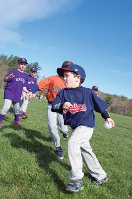 Old Rochester Little League
The Old Rochester Little League celebrated its Opening Day of the 2016 season on Saturday, April 30 at Gifford Park off Dexter Road in Rochester. The young athletes took part in the traditional Opening Day parade, which began at Dexter Park and concluded at Dexter Field. The players then circled the field for the National Anthem, with a flyover by Glenn Lawrence in his plane. After opening ceremonies, the first games of the season were held. Photo by Colin Veitch
