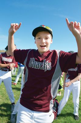 Old Rochester Little League
The Old Rochester Little League celebrated its Opening Day of the 2016 season on Saturday, April 30 at Gifford Park off Dexter Road in Rochester. The young athletes took part in the traditional Opening Day parade, which began at Dexter Park and concluded at Dexter Field. The players then circled the field for the National Anthem, with a flyover by Glenn Lawrence in his plane. After opening ceremonies, the first games of the season were held. Photo by Colin Veitch
