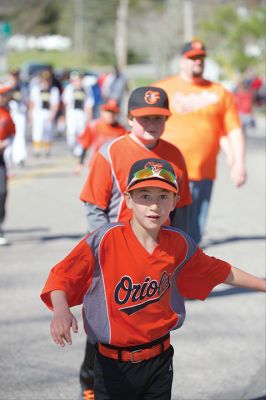 Old Rochester Little League
The Old Rochester Little League celebrated its Opening Day of the 2016 season on Saturday, April 30 at Gifford Park off Dexter Road in Rochester. The young athletes took part in the traditional Opening Day parade, which began at Dexter Park and concluded at Dexter Field. The players then circled the field for the National Anthem, with a flyover by Glenn Lawrence in his plane. After opening ceremonies, the first games of the season were held. Photo by Colin Veitch
