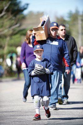 Old Rochester Little League
The Old Rochester Little League celebrated its Opening Day of the 2016 season on Saturday, April 30 at Gifford Park off Dexter Road in Rochester. The young athletes took part in the traditional Opening Day parade, which began at Dexter Park and concluded at Dexter Field. The players then circled the field for the National Anthem, with a flyover by Glenn Lawrence in his plane. After opening ceremonies, the first games of the season were held. Photo by Colin Veitch
