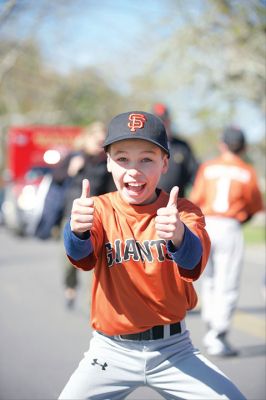 Old Rochester Little League
The Old Rochester Little League celebrated its Opening Day of the 2016 season on Saturday, April 30 at Gifford Park off Dexter Road in Rochester. The young athletes took part in the traditional Opening Day parade, which began at Dexter Park and concluded at Dexter Field. The players then circled the field for the National Anthem, with a flyover by Glenn Lawrence in his plane. After opening ceremonies, the first games of the season were held. Photo by Colin Veitch
