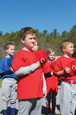 Old Rochester Little League
The Old Rochester Little League celebrated its Opening Day of the 2016 season on Saturday, April 30 at Gifford Park off Dexter Road in Rochester. The young athletes took part in the traditional Opening Day parade, which began at Dexter Park and concluded at Dexter Field. The players then circled the field for the National Anthem, with a flyover by Glenn Lawrence in his plane. After opening ceremonies, the first games of the season were held. Photo by Colin Veitch
