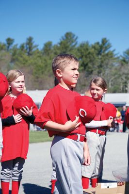 Old Rochester Little League
The Old Rochester Little League celebrated its Opening Day of the 2016 season on Saturday, April 30 at Gifford Park off Dexter Road in Rochester. The young athletes took part in the traditional Opening Day parade, which began at Dexter Park and concluded at Dexter Field. The players then circled the field for the National Anthem, with a flyover by Glenn Lawrence in his plane. After opening ceremonies, the first games of the season were held. Photo by Colin Veitch
