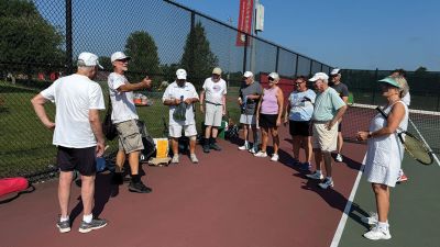 Silver Sneaker
Mike Hickey presented to Peter Hemingway. a well deserved "Silver Sneaker" award and another thoughtful gift before he retires to upstate New York. We wished him the very best and will miss his play and cheerful approach to every point! All the best, Peter and family. MCTA serves senior tennis players from all over the Southcoast and is always welcome to new members. You may call Ellen Foss at 978-844-1117 or Mike Hickey at 781-888-1110
