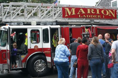 FD Open House
The Marion Fire Department held an Open House on October 10, 2009. The public was welcome to tour the facilities, and children enjoyed exploring all the engines available at the station. Donuts, coffee, and a hot breakfast were all offered courtesy of the fire department. An antique engine even offered a ride around the village. Photo by Anne O'Brien-Kakley
