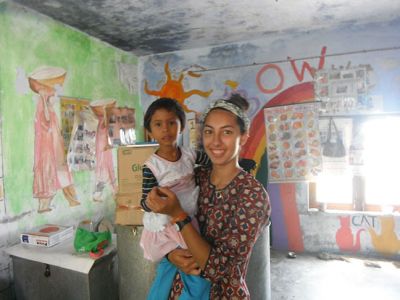 Mia Resendes 
Mia Resendes is a 16 year-old Rochester resident and ORRHS junior suffering from uveitis, a rare eye disease that is one of the leading causes of blindness. She is a major advocate and fundraiser for an organization working towards finding a cure and raising awareness of uveitis. Pictured here, Mia poses holding a young girl from a pre-school in India where Mia spent time as a volunteer. Photo submitted by Andrea Pateastas
