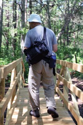 MLT Bridge
Mattapoisett residents Geoff King and Paul Osenkowski, along with Luke Buckley and Alex Buckley installed the footbridge over a stream on a Mattapoisett Land Trust trail on July 3, 2010. Photo by Andrea Buckley.
