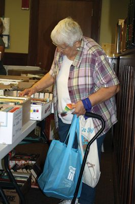 Friends of the Mattapoisett Library
The Friends of the Mattapoisett Library held its annual book sale during the Harbor Days week. The Aardvark popped in on Thursday, July 14, to buy some books and pass out squeaky aardvarks to the kids. Photos by Jean Perry
