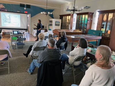 Marion Natural History Museum
On November 15, the Marion Natural History Museum’s community group enjoyed a presentation on the geology of cranberry bogs with USDA soil scientist Maggie Payne. We heard about the glaciers that covered our area and left glacial moraines or hills in some areas of our state, as well as glacial outwash in our area. These outwash areas of sand and gravel can be extremely deep. Chunks of ice melting on the landscape turned into kettle ponds, which filled with groundwater and eventually plants. 
