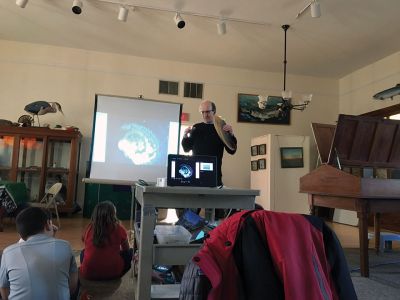 Marion Natural History Museum
On Valentines Day, the Marion Natural History Museum's afterschool group had a chance to learn about humpback and right whales. Dr. Moore of the Woods Hole Oceanographic Institution showed the students how a drone may be used to observe a whale's spout to determine its health. We also had a chance to view bubble-netting practices of humpbacks, see how baleen plates fit in a whale's mouth, and discussed the hazards the whales face due to entanglements in fishing gear. Photo courtesy Elizabeth Leidhold
