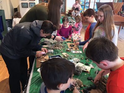 Marion Natural History Museum
The Marion Natural History Museum after school group had a great time working with natural materials to create structures, candleholders, jewelry boxes, cairns, and a communal landscape complete with bridge, benches, and trees. As usual, the kids exhibited outstanding cooperation, creativity, and imagination. The museum thanks the following for helping the students with their creations: David Dodge, Faye Parker, Katie Resendiz, Kylie Snider, Alex Giannans and Evan Costa. Photo courtesy Elizabeth Leidhold
