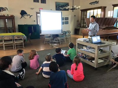 Marion Natural History Museum
The Marion Natural History Museum wishes to thank Blake Dinius, entomologist with the Plymouth County Extension Service, for sharing his knowledge of our backyard bugs.  Did you know that the cecropia moth is Massachusetts’ largest insect? And that it has a wingspan of up to 6 inches? Blake also brought in a live praying mantis and many specimens of moths and winged insects under glass to take a close up look at with magnifiers. The museum also wishes to thank all the volunteers who helped with the program 
