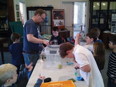Marion Natural History Museum
The Marion Natural History Museum welcomed a visit from Mark Whelan, engineer with Sippican/Lockheed Martin Corp.  Mark allowed us to experiment with compression, stability and buoyancy. We built our own submarines and figured out how to make it sink, but not too fast. Then we held a race to see whose submarine sank the slowest. The group had a great time working with all the materials and we’d like to thank Mark and Sippican/Lockheed Martin for the wonderful program. 
