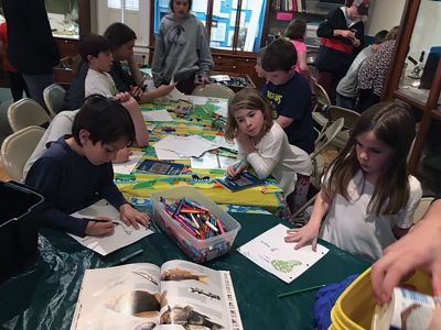 Marion Natural History Museum
On Wednesday, the Marion Natural History Museum after-school group had fun inspecting some of the residents of vernal pools. With the use of magnifying glasses, we studied wood frog and salamander egg masses, log-cabin caddis-fly larvae, tadpoles, and various bugs. All specimens were returned to their original pool and now the students can recognize and, hopefully, protect these animals in the future. We also had a chance to handle some sphagnum moss and took a close look at the plant's structure to see why
