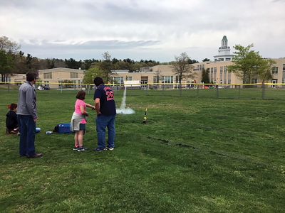 Marion Natural History Museum
On Wednesday, the Marion Natural History Museum's after school group had a great time constructing their own rockets. We added fins, nose cones, parachutes to the main body of the rockets, and then added protective wadding to prevent the rocket from exploding. We then headed outside to launch our creations. Every one of the rockets had a successful launch, thanks to the help and expertise of our many volunteers. The museum wishes to thank Mike Cronin, Jake Cronin, Matt Alves, David Dodge, the Tabor Academy 
